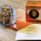 Prodotti Legerity Skin Care by Screen: Renewal Face Fluid, Pro-Age Face Cream e Gold Eye Patch, presentati in un elegante packaging dorato e trasparente.