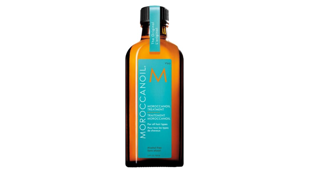 Bottiglia di Moroccanoil Treatment, olio per capelli a base di olio di argan, con etichetta turchese e logo arancione.