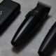 Set di strumenti professionali JRL Professional, composto da tagliacapelli, rifinitore e rasoio elettrico in elegante design nero opaco.