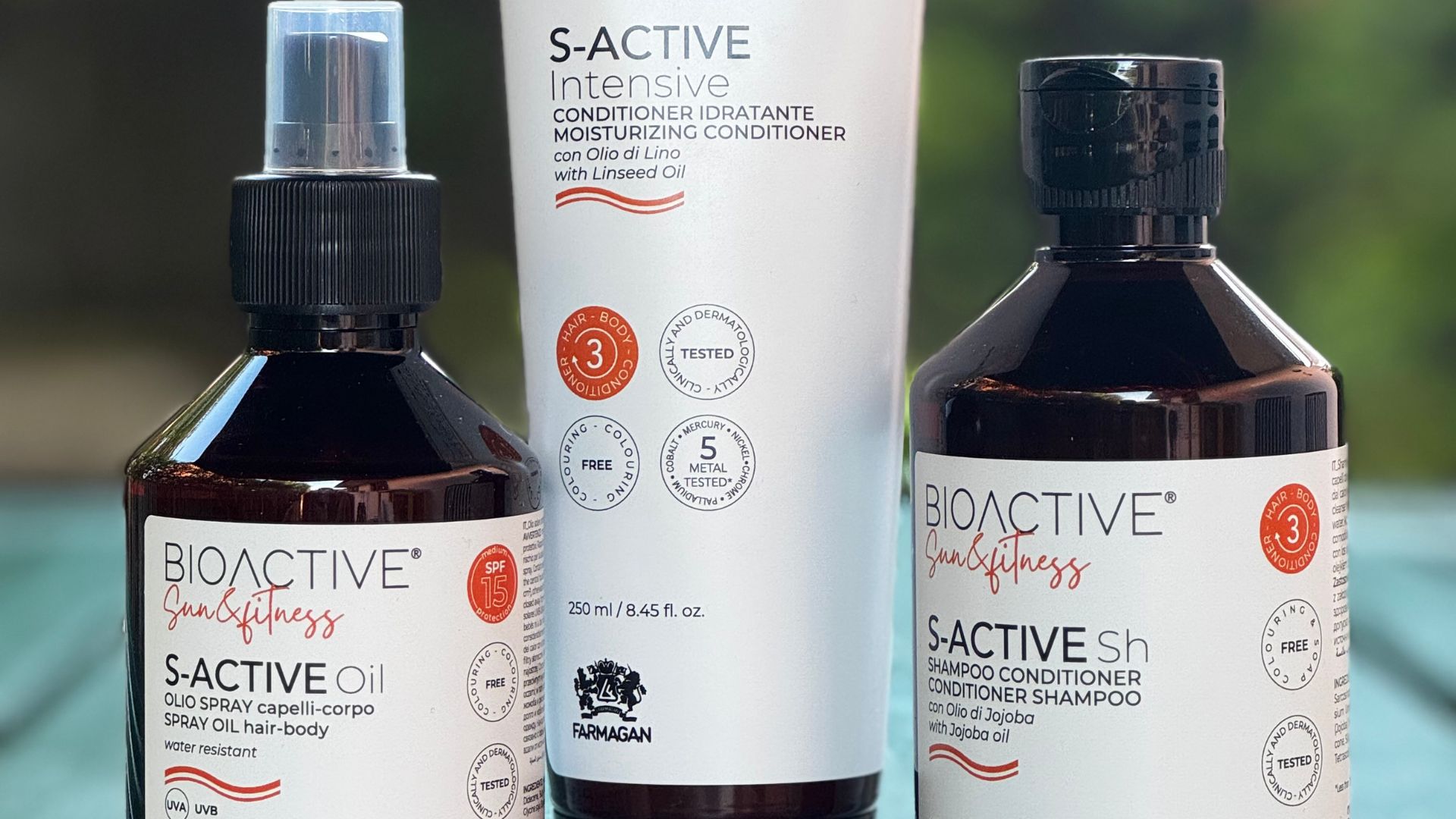 Linea BIOACTIVE Sun & Fitness di Farmagan: spray bifasico, shampoo e conditioner idratante con protezione solare per capelli e corpo