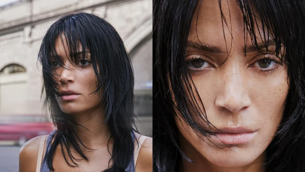 "Elodie con frangia piena lunga e leggermente bombata, ideale per valorizzare i capelli lisci con carattere."