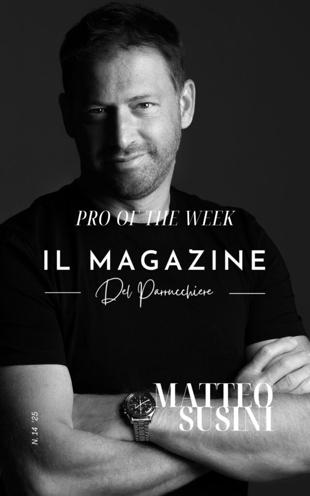Ritratto in bianco e nero di Matteo Susini, selezionato come “Pro of the Week” da Il Magazine del Parrucchiere. Indossa una t-shirt scura e un orologio al polso, posa a braccia conserte con un sorriso accennato. Sul fronte, la grafica riporta il titolo “Pro of the Week”, il logo de Il Magazine del Parrucchiere e il nome Matteo Susini.