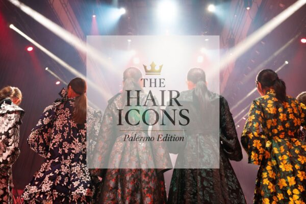 Hairstylist e modelle sul palco illuminato durante The Hair Icons Palermo Edition 2025, show di moda e acconciature alle Officine Sandron.