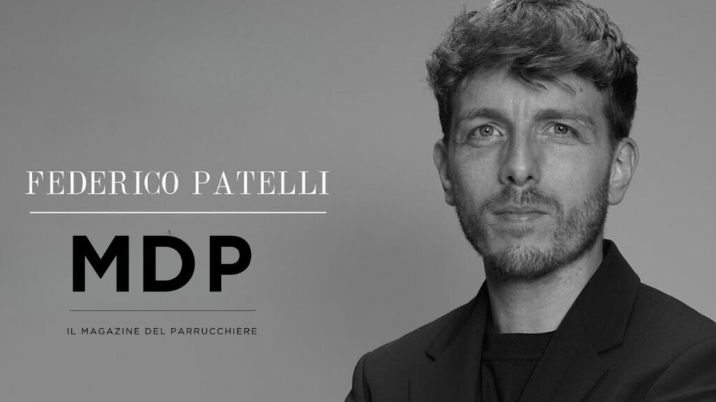 Primo piano in bianco e nero di Federico Patelli, vincitore del British Hairdressing Award, per il lancio della rubrica Education su Il Magazine del Parrucchiere (MDP).