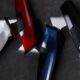 Tosatrici professionali JRL serie 3000C nei colori bianco, rosso, blu e nero posizionate su base in cemento.