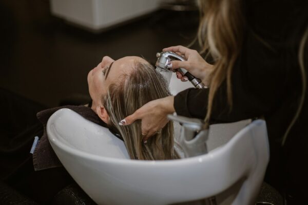 Salon client receiving a professional hair service