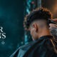 Logo THE HAIR ICONS Milano con sfumatura barber eseguita sul palco