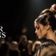 Logo THE HAIR ICONS Milano con hairstylist al lavoro sotto le luci dello show