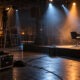 Palco con luci accese e postazione styling durante l'allestimento di THE HAIR ICONS Milano