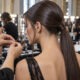 Backstage at Milan Fashion Week SS27: very low ponytail with loose face-framing pieces