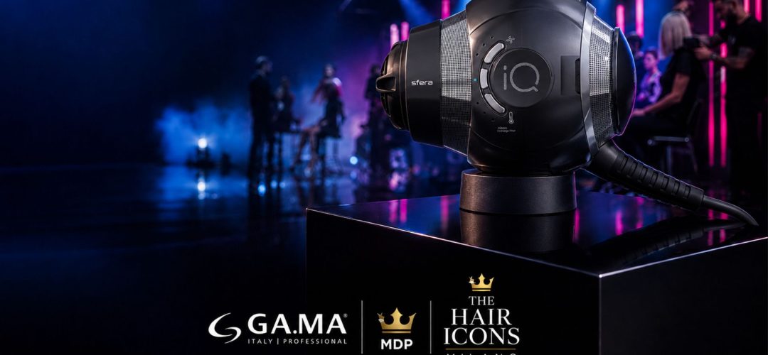 Copertina evento THE HAIR ICONS Milano con il nuovo asciugacapelli professionale Ga.Ma Professional iQ Sfera in primo piano su sfondo scenico blu e magenta, ambientazione salone hairstyling futuristico